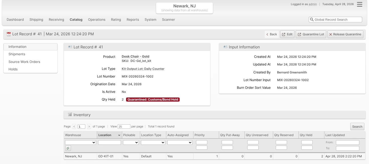 Lot view info page after quarantine, showing Qty Held: 2 with the "Quarantined: Customs/Bond Hold" badge and Quarantine Lot / Release Quarantine buttons in the header